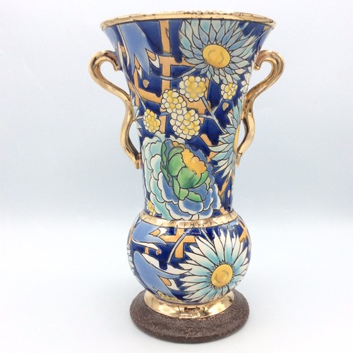 Vase anses faïence de - à,